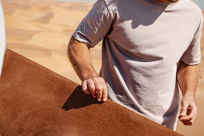 2hr COMBO - 1hr Lie-down Sandboarding and 1hr Quad Bike ride - The second hour: sliding down a dune on your stomach