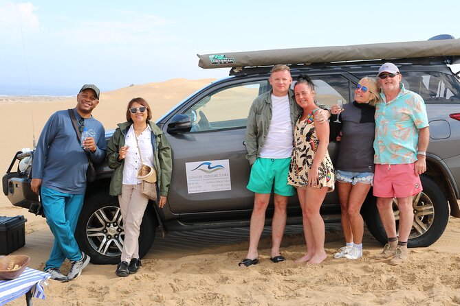 Sandwich Harbour 4x4 Tour - Salt pans, lagoon water, and flamingos