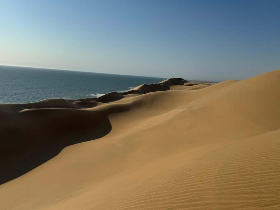 Walvisbay: Sandwich Harbour SUNSET Tour-End It Beautifully - The sunset viewpoint and the Atlantic